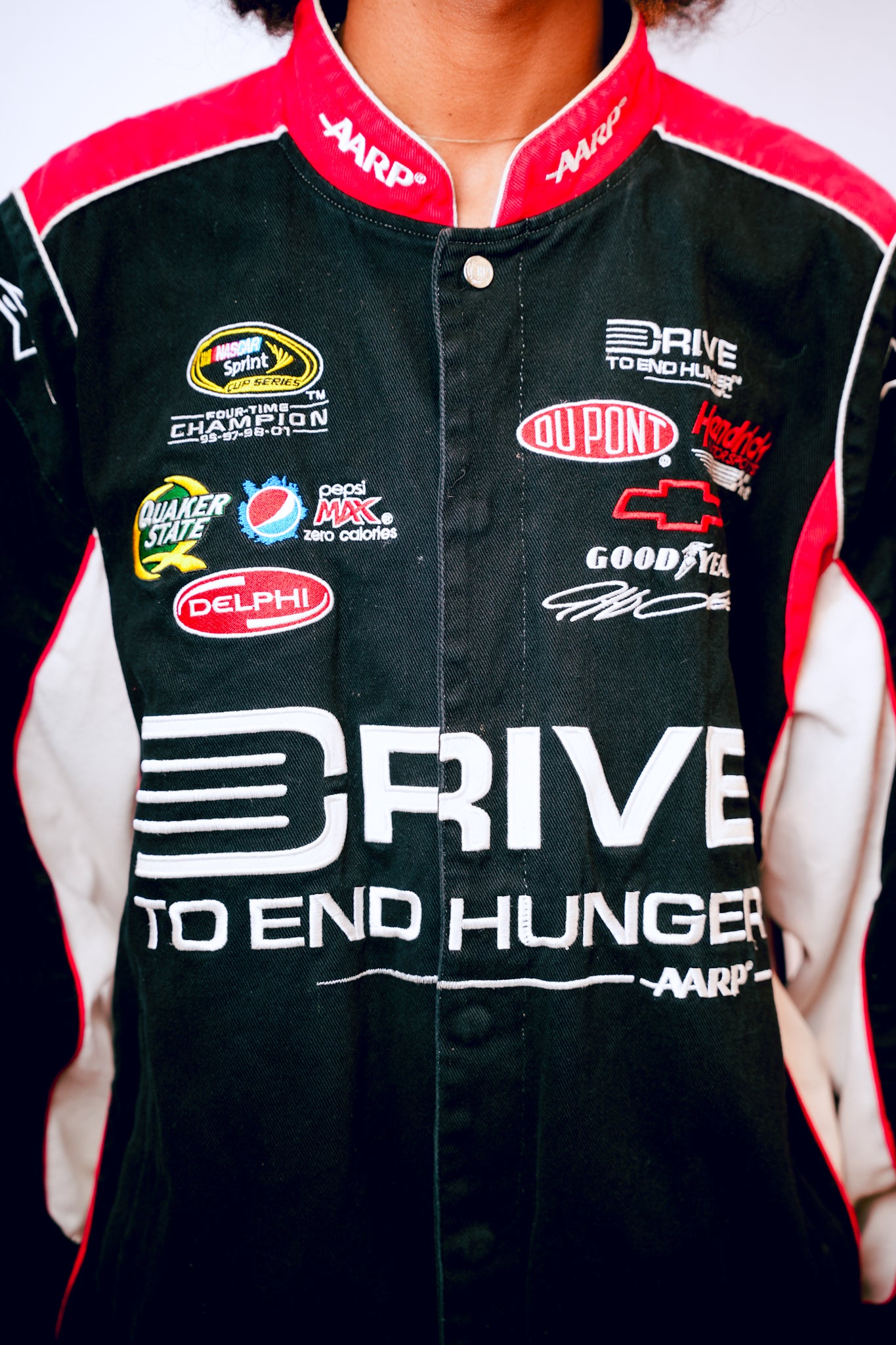 JH Design 24 NASCAR AARP Drive to End Hunger Varsity Jacket